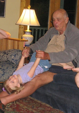 2006_09_03 Cate and Grandpa the jngle gym.jpg